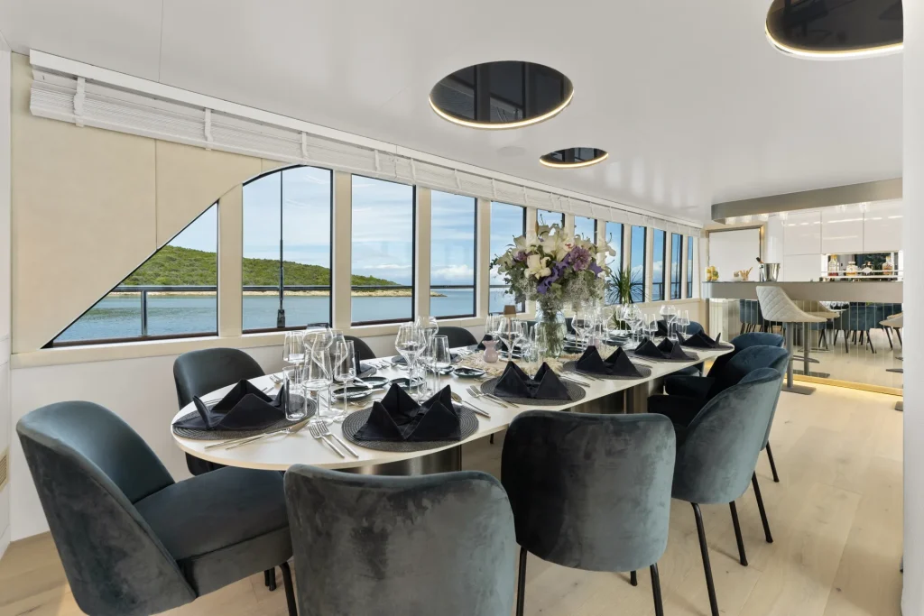 49.-MAXITA-Formal-dining-in-salon-Main-deck